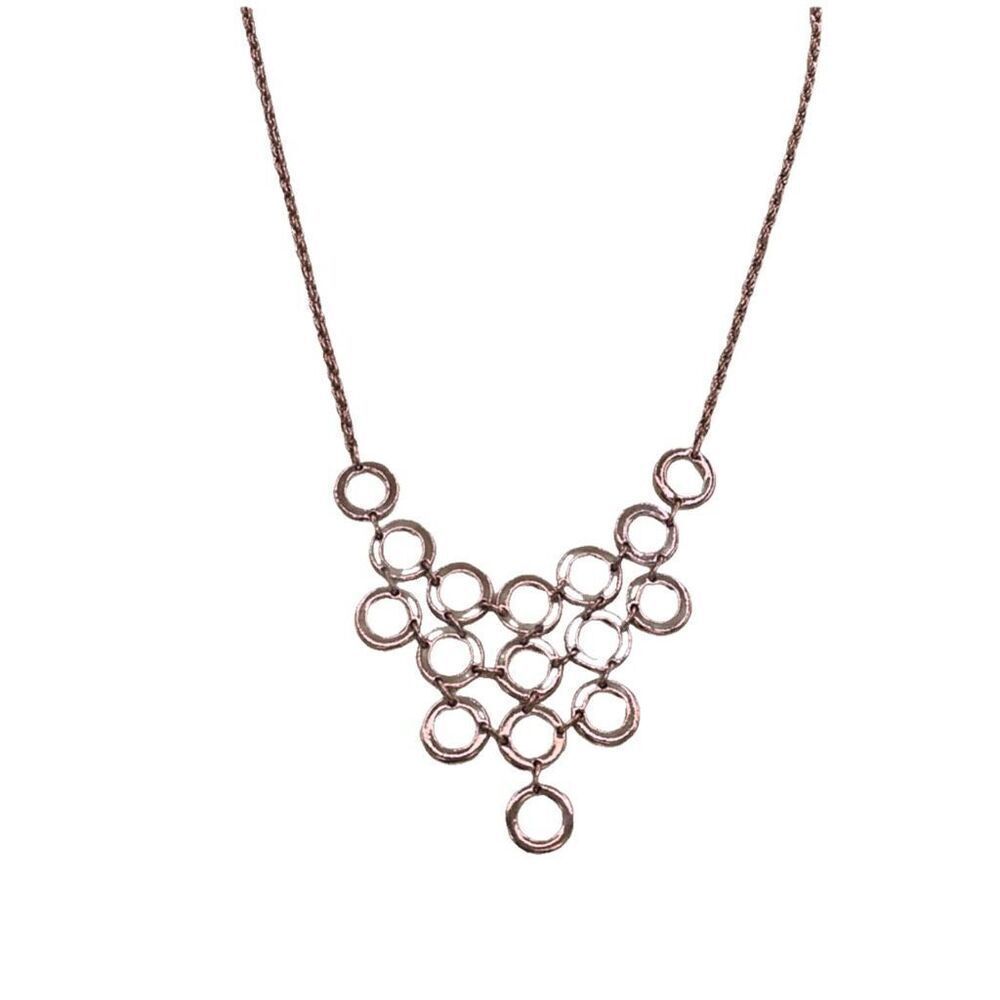 Anne Klein gold colored layered circle pendant necklace.